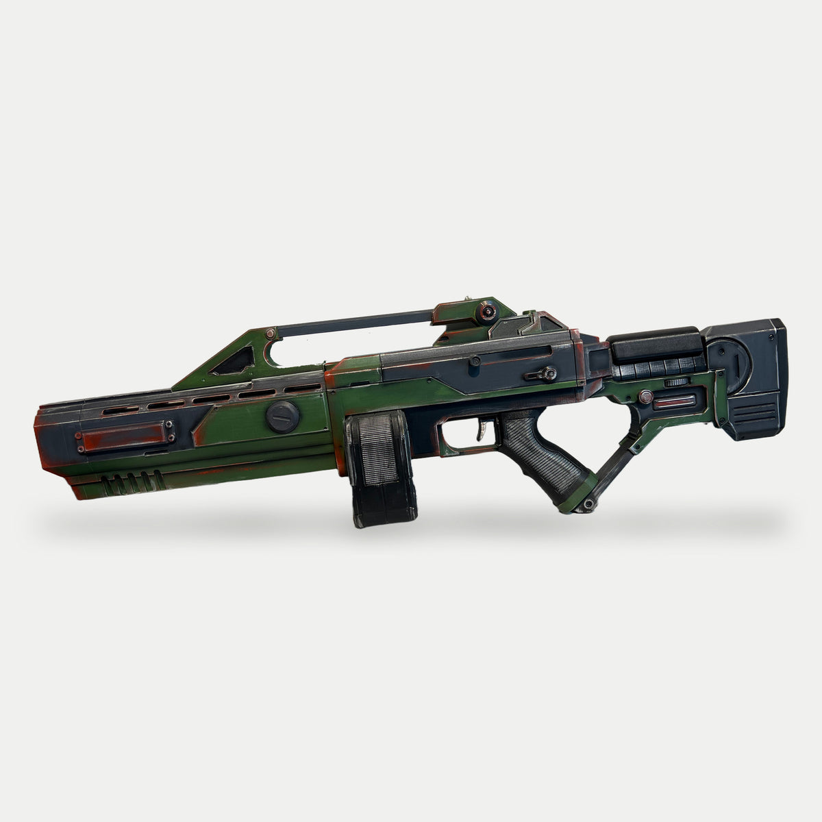 Side view of the Command & Conquer AR-70 Raptor prop with its long receiver slot, carry handle and skeleton stock, muzzle facing left.