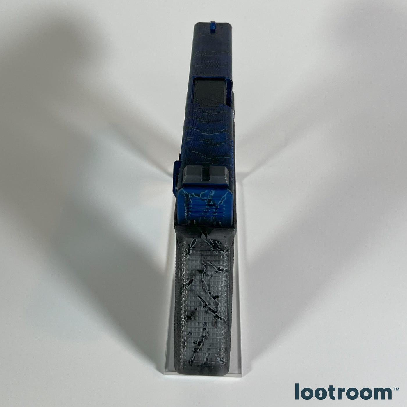 Top view of the CS2 Glock-18 Blue Fissure prop, the black cracks running along the slide