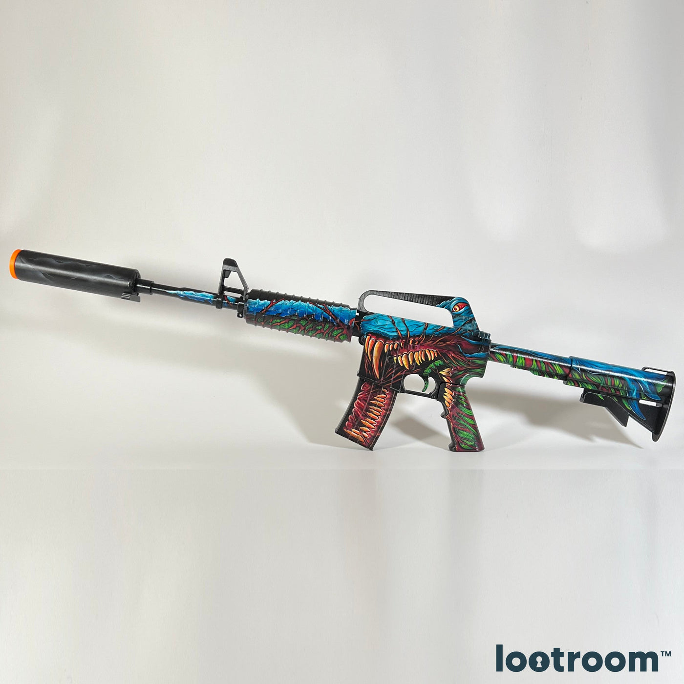 The CS M4A1-S printed and painted in the Hyper Beast skin, with the silencer attached, which prints as its own part