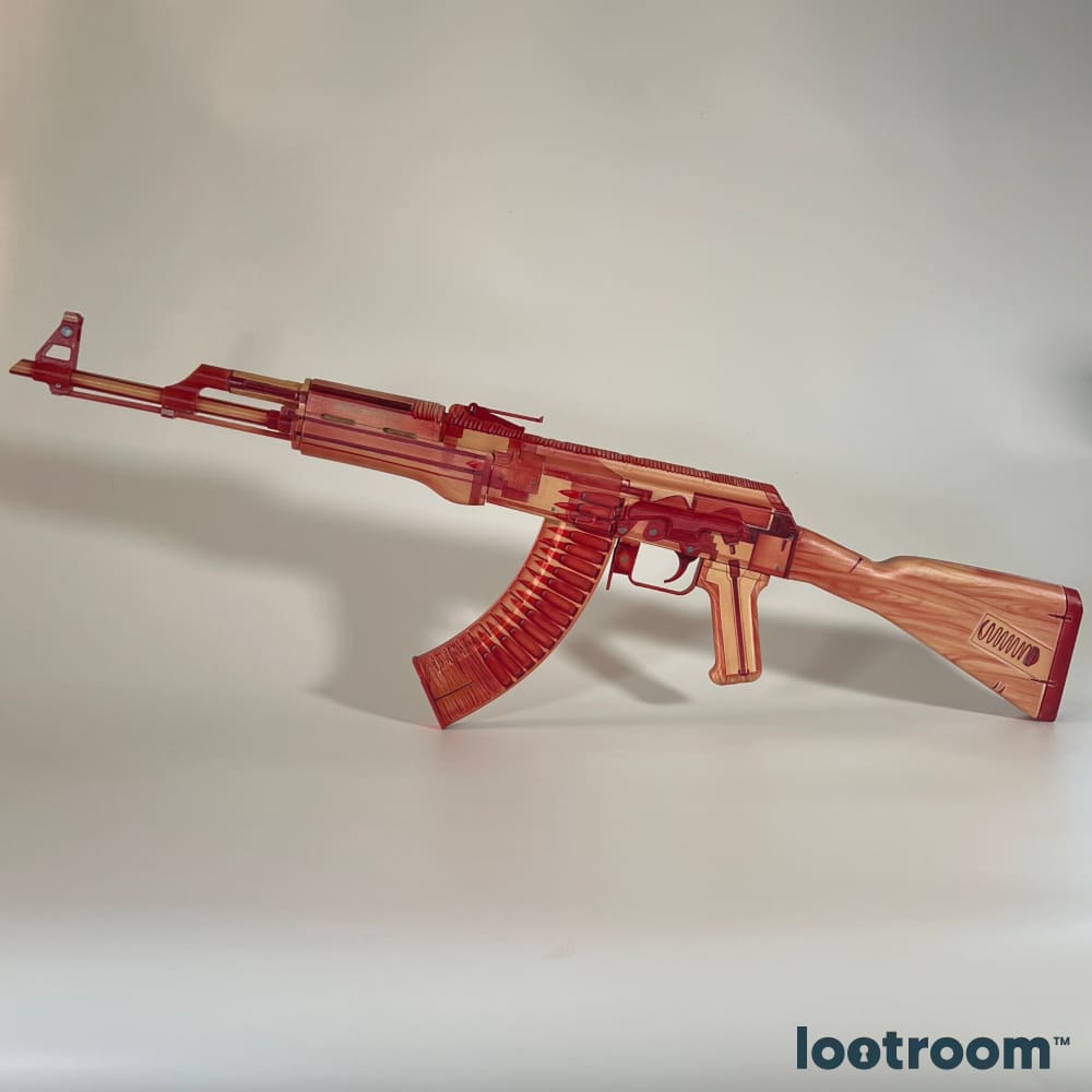 The CS AK-47 printed and painted in the X-Ray skin, seen from the side. These files produce the raw parts; the finished prop is sold separately
