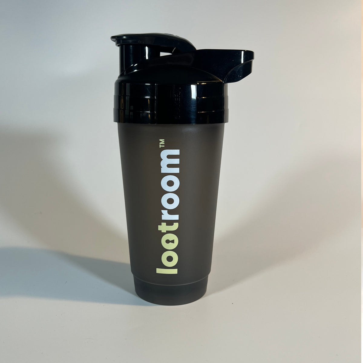 Lootroom Shaker, 700 ml smoky-black protein shaker with black lid and printed lootroom logo