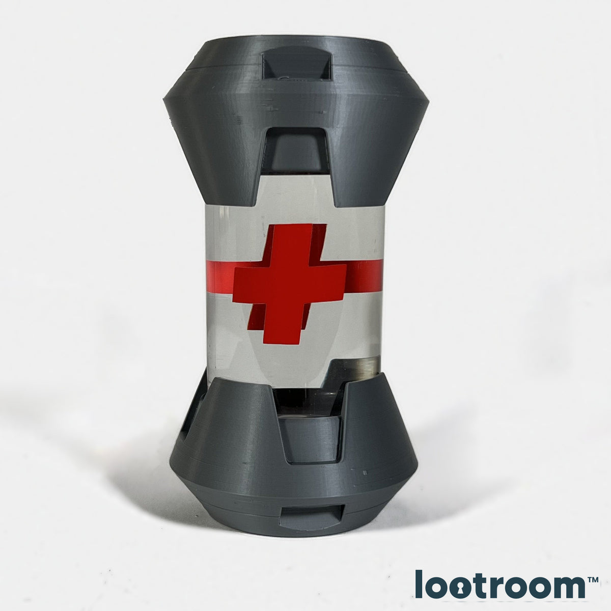 Overwatch Health Pack IRL, clear jar with red cross between two silver-grey 3D-printed shells