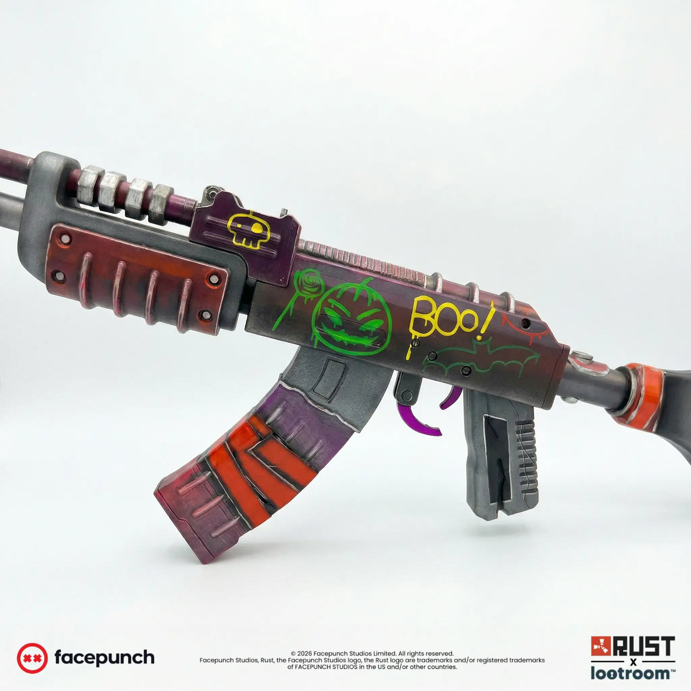 Close-up of the Rust Candy Hunter AK receiver with the green pumpkin, the bat and the yellow BOO