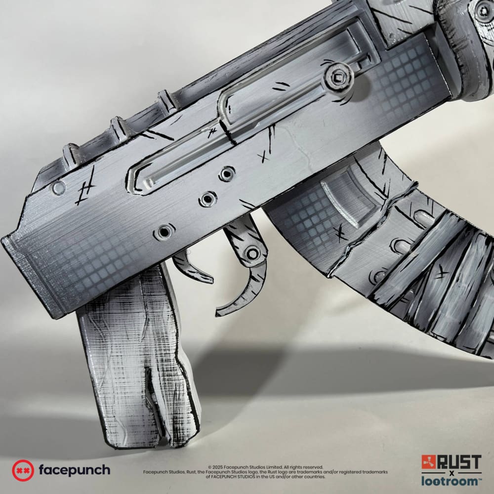 Close-up of the Comics AK receiver and curved magazine, dot screen printed across the flat panels.