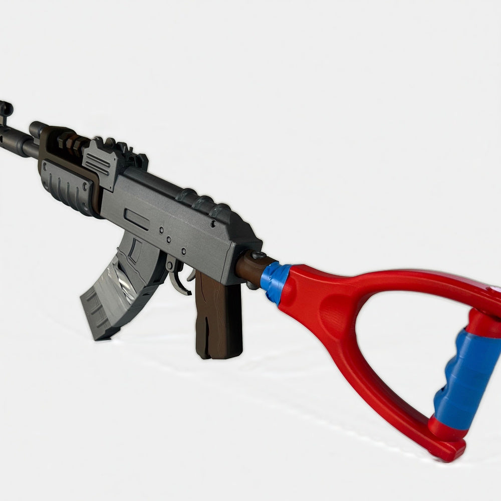 The darker Default AK prop from behind, showing the grey tape wrapped around the magazine.