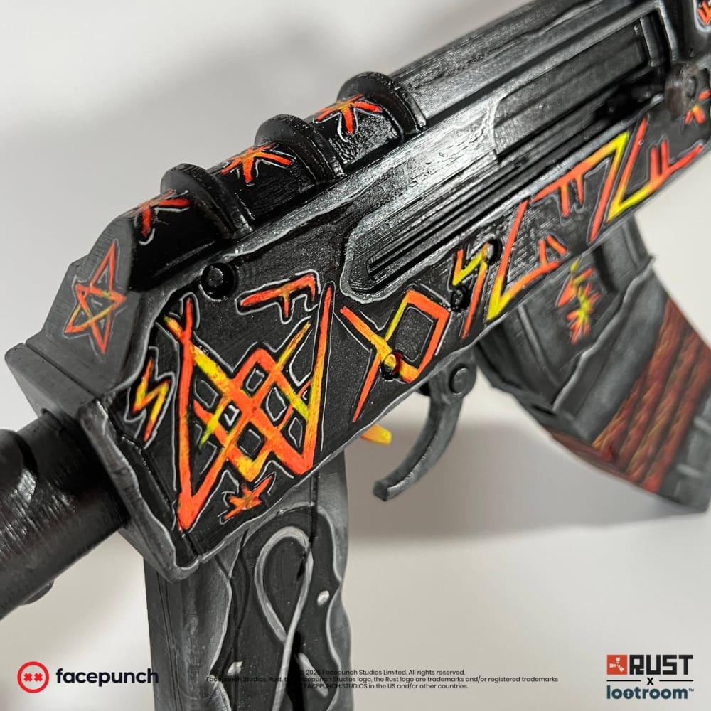 Close-up of the From Hell AK receiver, hand-drawn glyphs and a pentagram along the rail.