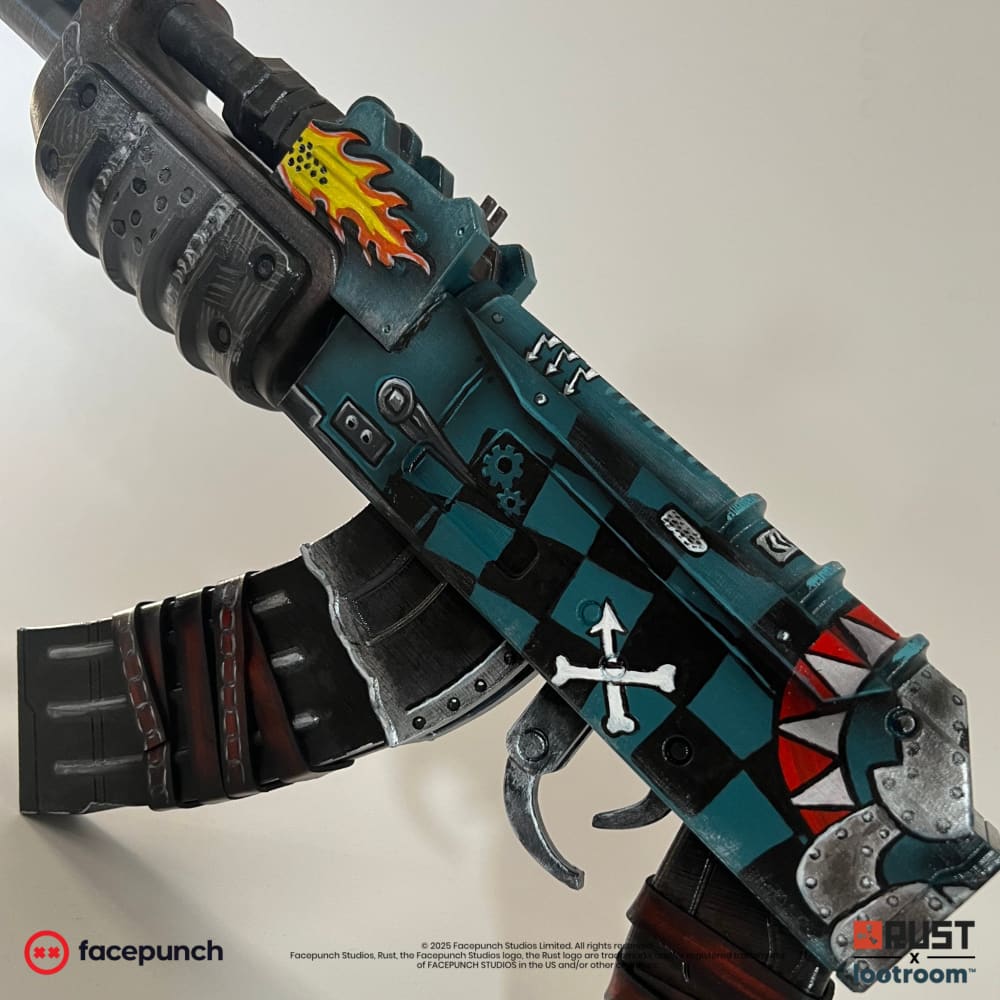 Rust Gearlord AK prop at an angle, the cogwheel and spanner marks visible along the flank.