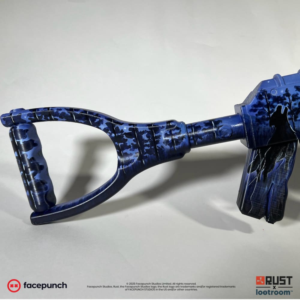 Close-up of the isvolcano AK loop stock, tree silhouettes carried around the frame.