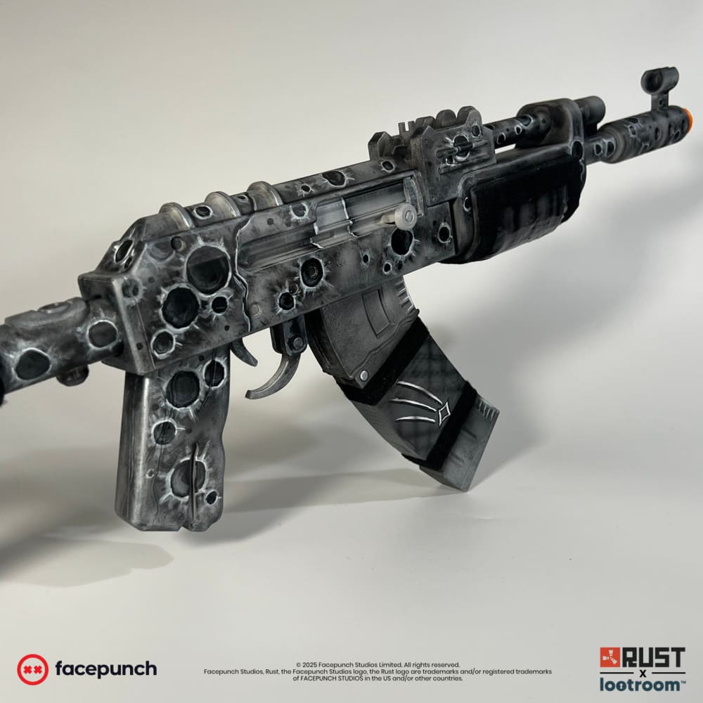 Rust Lunar AK prop at an angle, the cratered surface carrying on across grip and handguard.