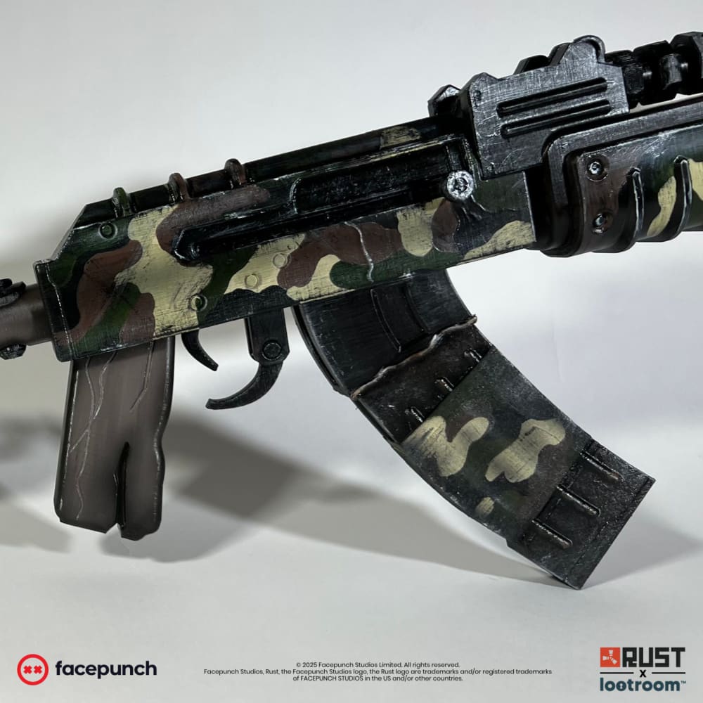 Close-up of the Military Camo AK receiver and curved magazine, camo covering both end to end.