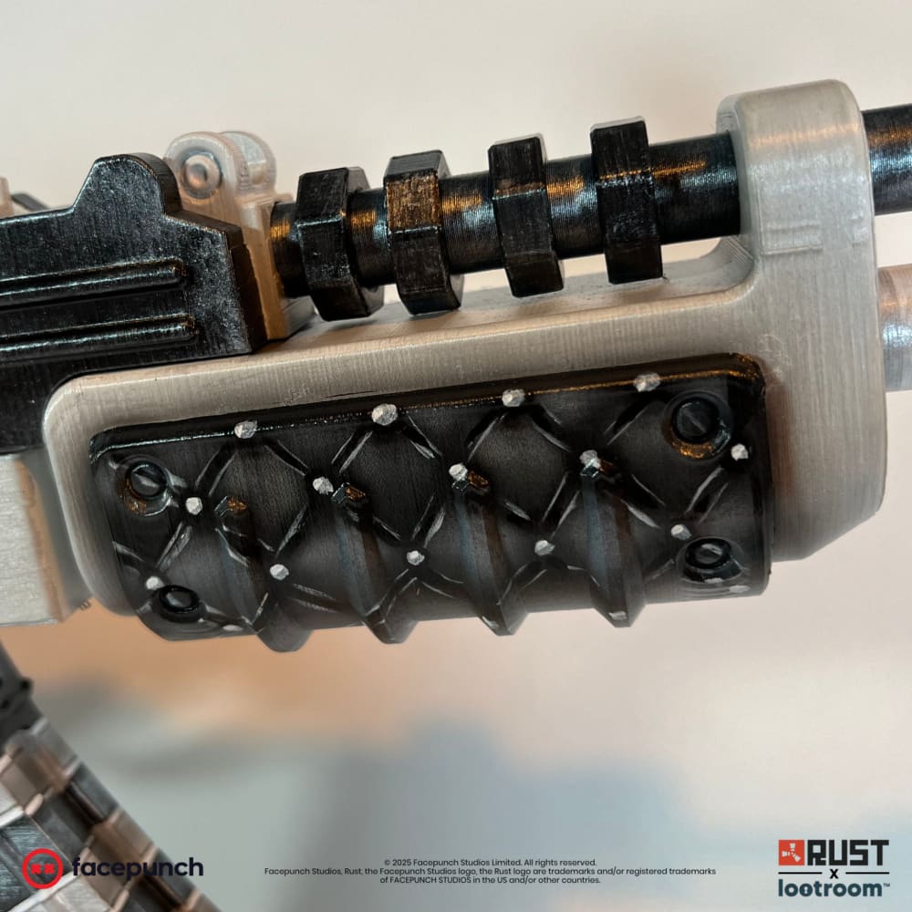 Close-up of the No Mercy AK handguard, raised black diamonds with a white rivet at each point.