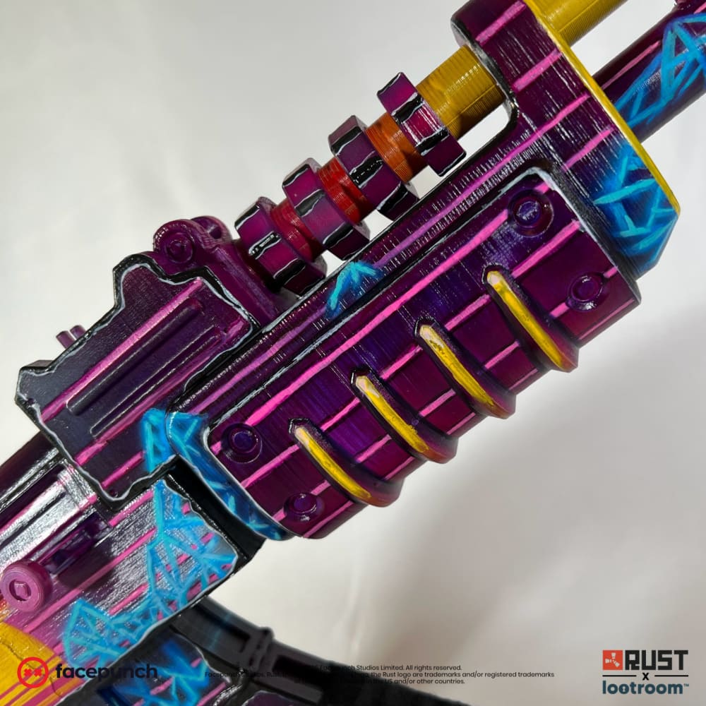 Close-up of the Retrowave AK handguard, yellow slots set against purple and neon pink.