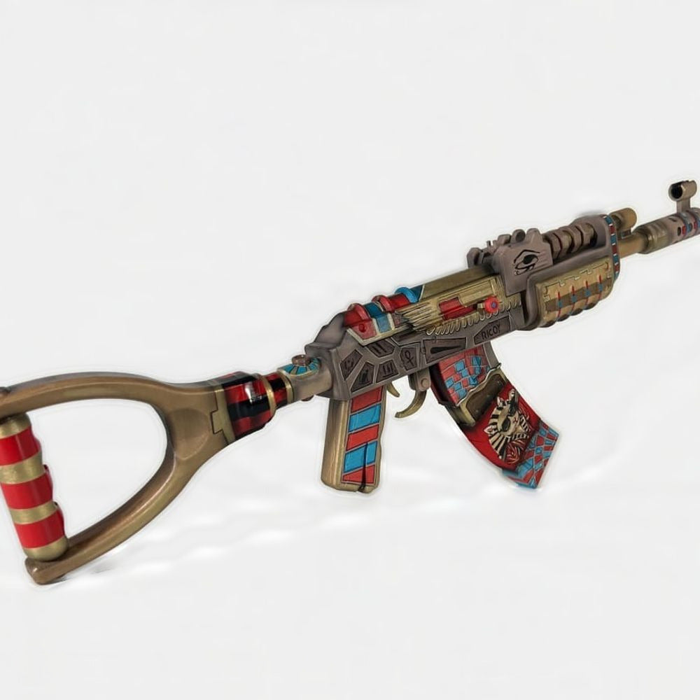 The Ricoy AK prop from behind, with the red and gold rings on the stock grip.