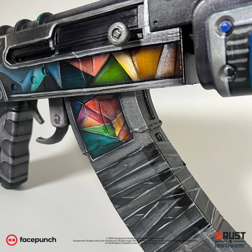 Close-up of the Rustoria AK receiver and magazine, crystal facets in turquoise, green and orange.