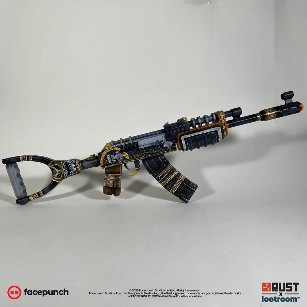 Rust Ser Winter AK prop, full side view of the 75cm build with gold runes along the receiver.