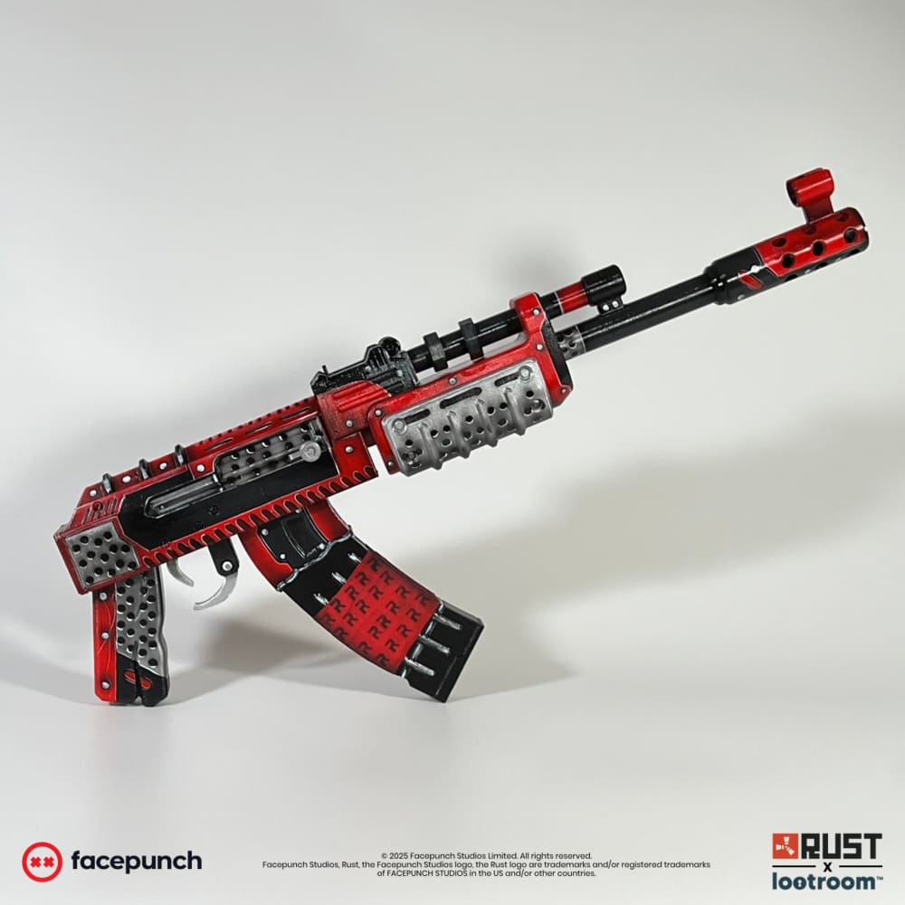 Rust Team Rocket AK prop, full side view of the red and black 50cm build.