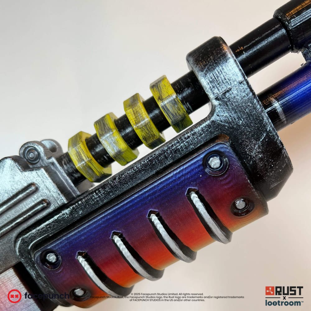 Close-up of the Tempered AK handguard, blue running through violet into red and orange.
