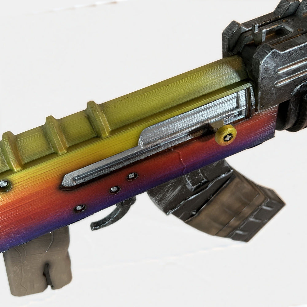 Close-up of the Tempered AK receiver from above, olive-yellow shading through orange and red into violet.