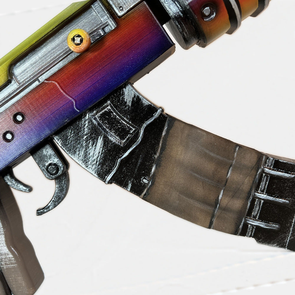 Close-up of the Tempered AK trigger and magazine, with the receiver above running violet into red.
