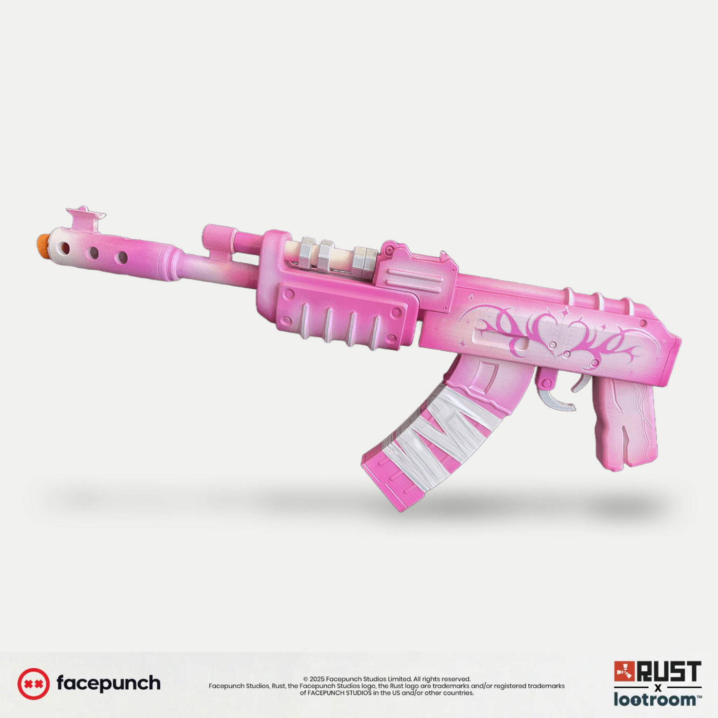 Rust VayBae AK prop in bright pink, 50cm short-stock side view with the painted heart on the receiver