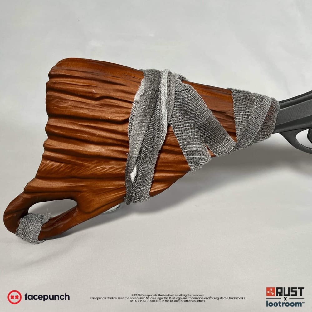 Stock of the Rust Bolt prop with its carved grain and the real bandage wrap