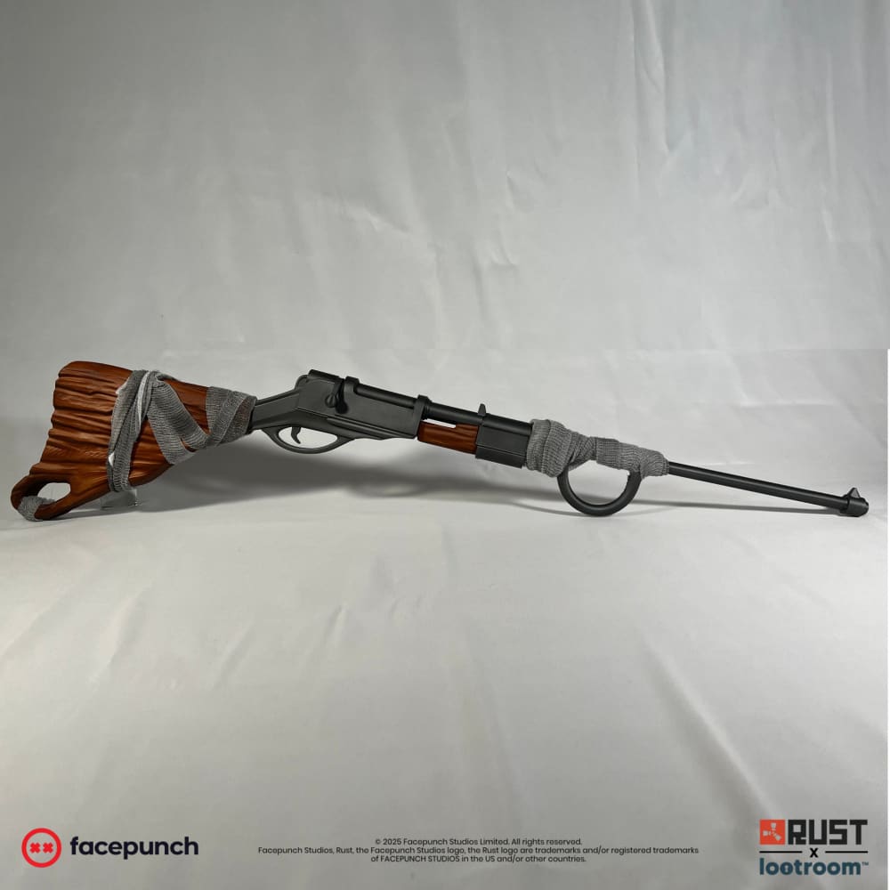 Rust Bolt Action Rifle prop from the side, full 107cm with carved wood-look stock and gunmetal barrel