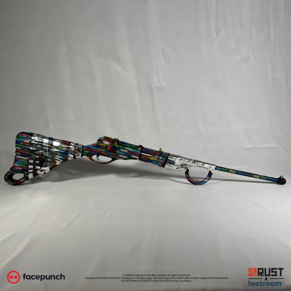 Rust Posty Bolt prop, full side view of the 107cm rifle built from coloured toy bricks.