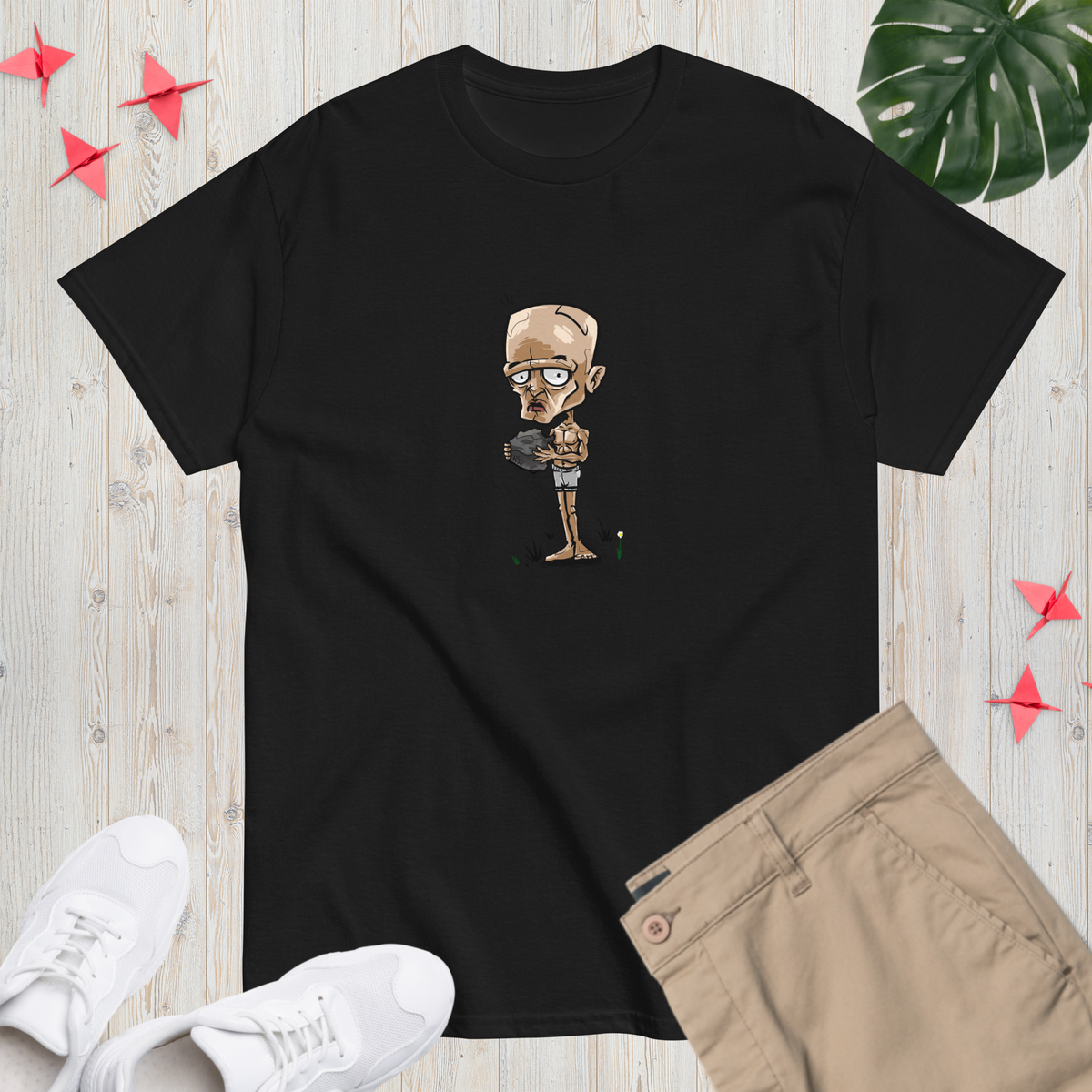 Rust Comic New Player unisex t-shirt in black, fresh spawn with a rock printed on the chest