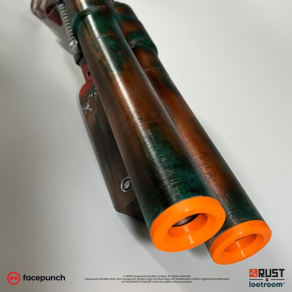Barrel detail of the Rust Double Barrel prop showing the copper and green patina