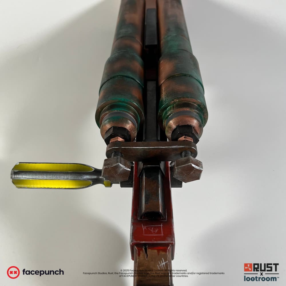Top view of the Rust Double Barrel prop showing both patinated barrels and the yellow cocking lever