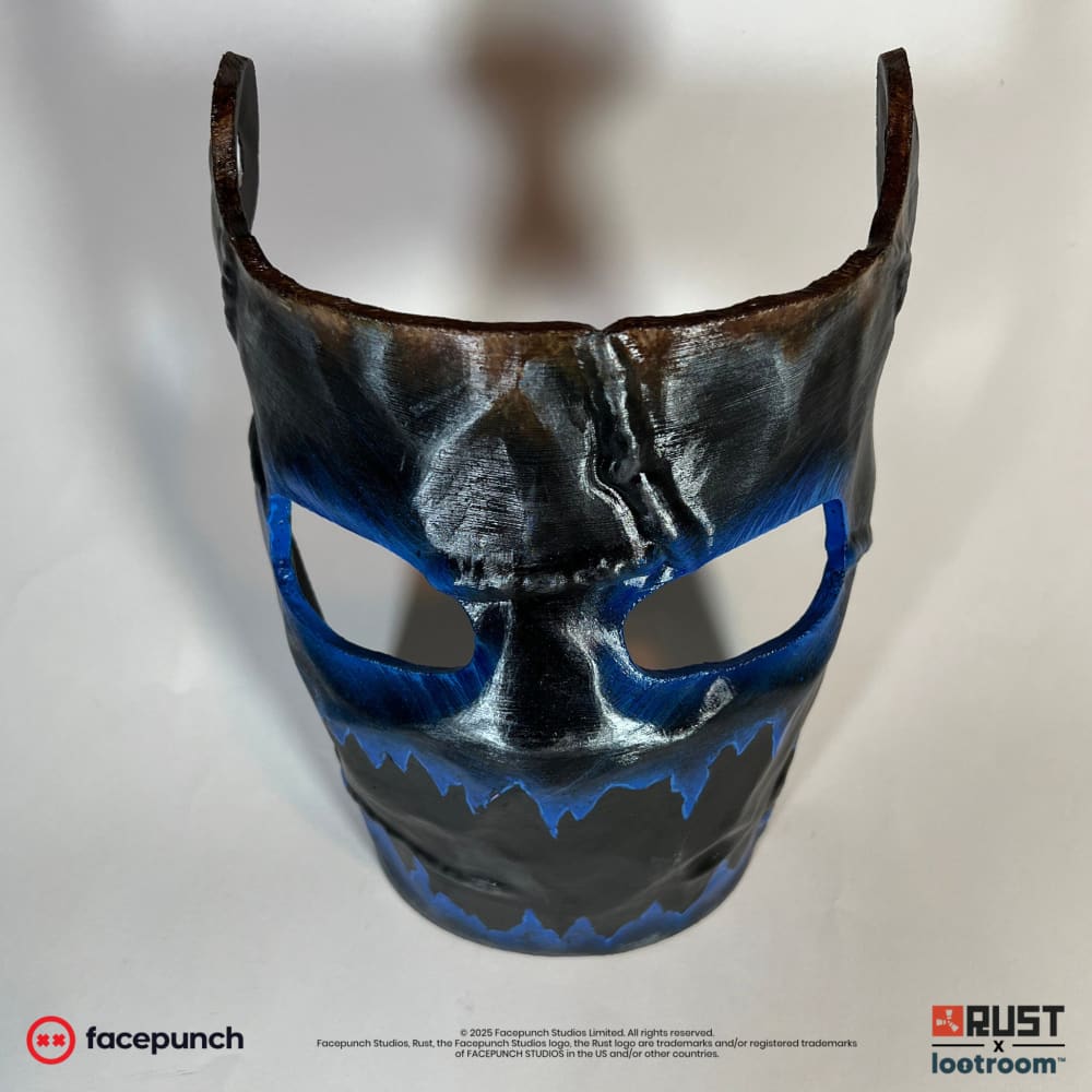 Rust Frostbite facemask prop from the front, white highlights on the brow and the cheekbones