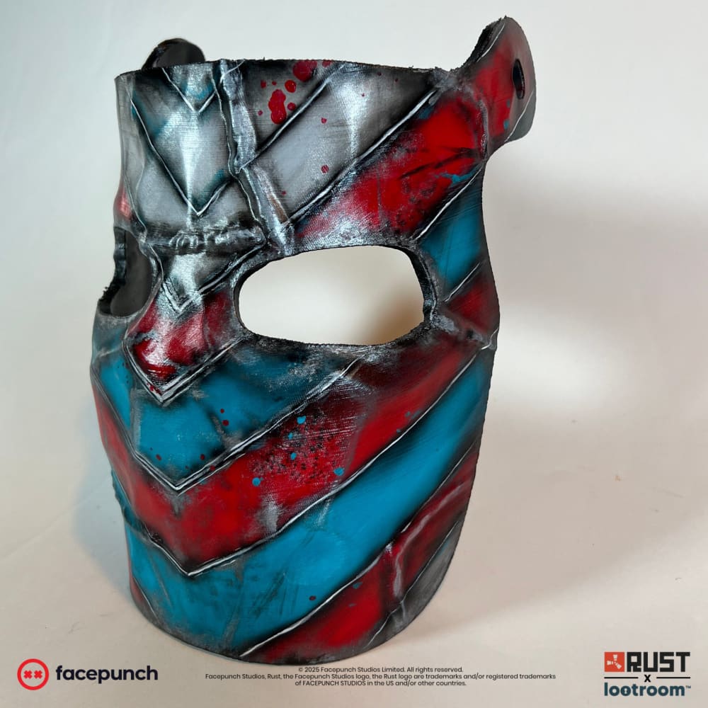 Rust IOK facemask prop from the other side, one of the two pre-drilled holes visible at the top