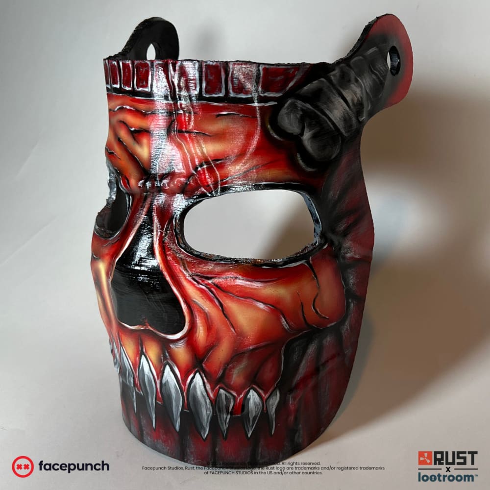 Rust Killjoys facemask prop at an angle, showing the ribbed grey bolt on the side