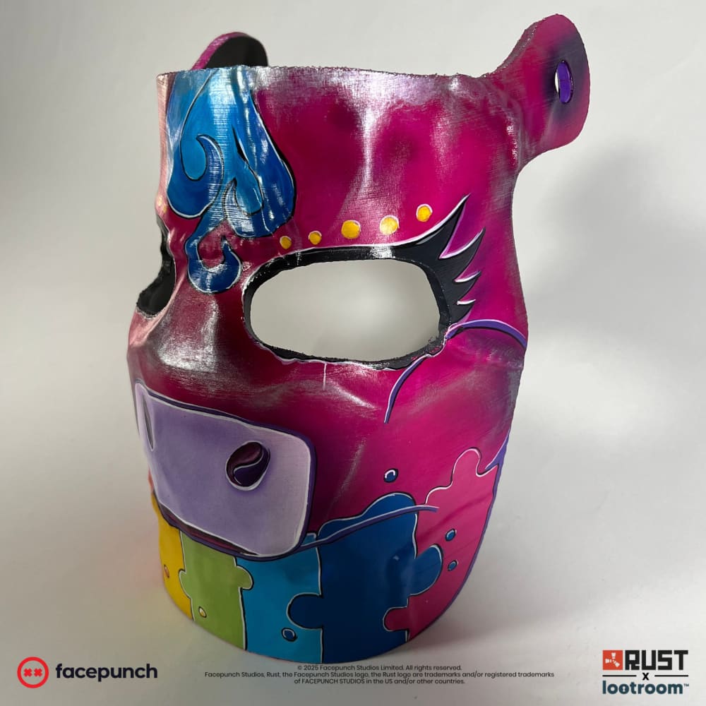 Rust Rainbow Pony facemask prop from the other side, with the black lashes and lavender muzzle