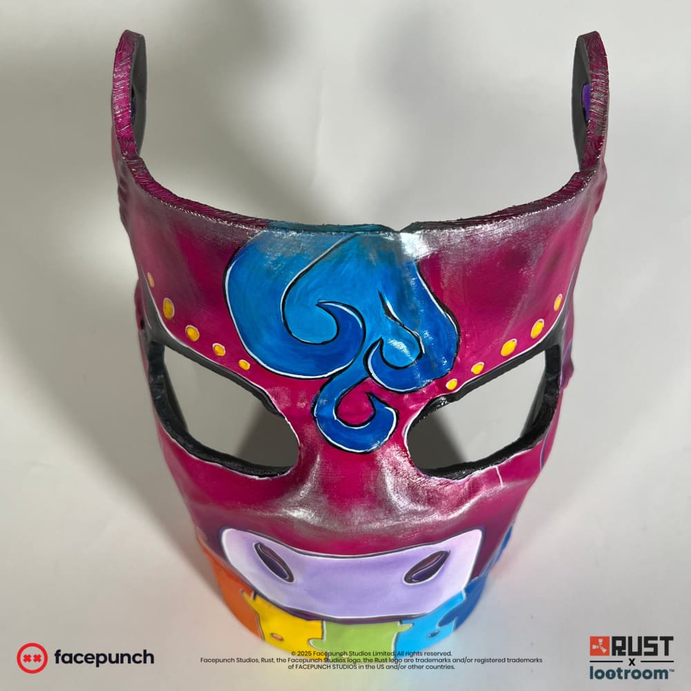Rust Rainbow Pony facemask prop, front view showing the gold browband dots above the eyes