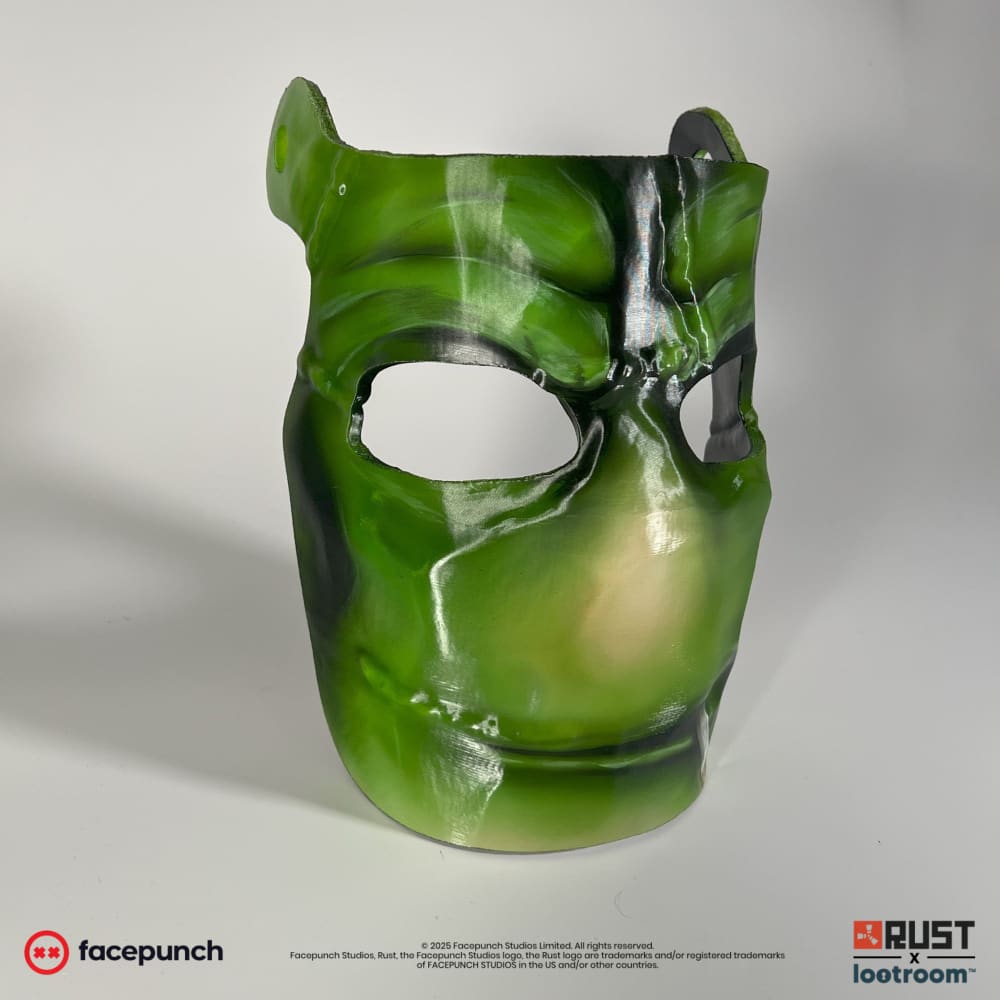 Rust StableRonaldo facemask prop at an angle, showing the white highlights on the brow and nose