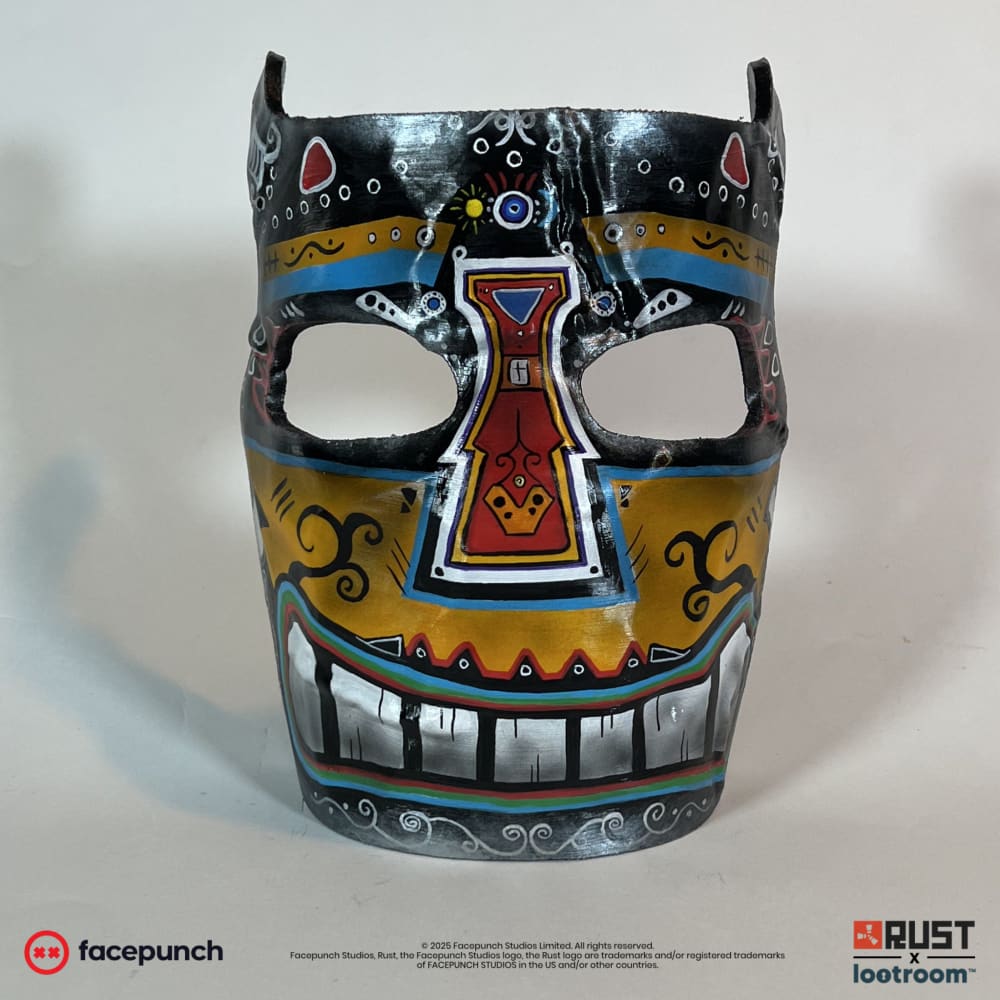 Rust Sunrise facemask prop, front view of the folk-art skull with a grin of silver teeth