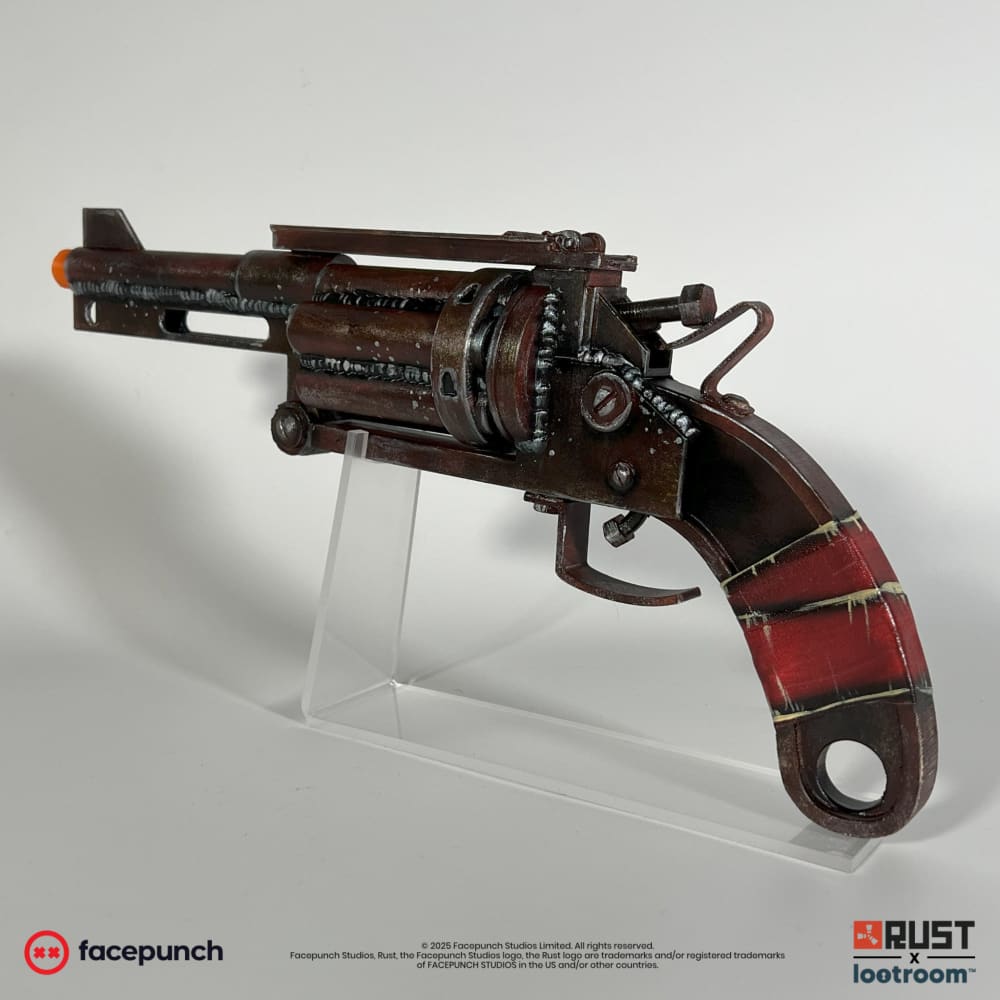 Rust High Caliber Revolver prop at an angle, showing the cylinder and the slotted barrel