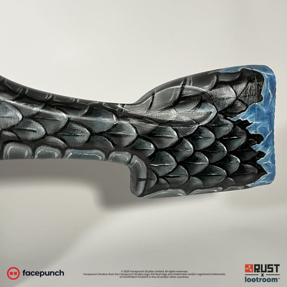 Close-up of the Frost M249 stock, hand-shaded black scales fading into ice blue at the butt.