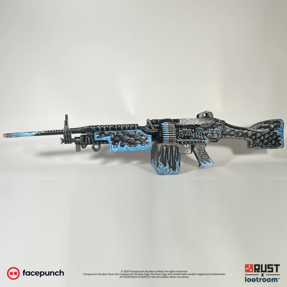 The hand-painted Rust Frost M249 built from these STL files, shown assembled and finished.