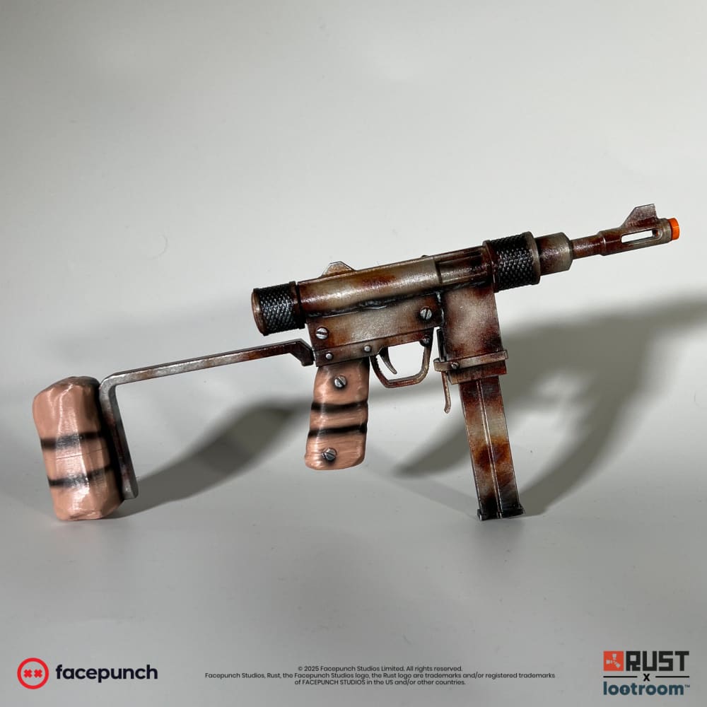 Rust Mini SMG prop from the right, 30cm miniature with a rusted-metal look and wood-look grip