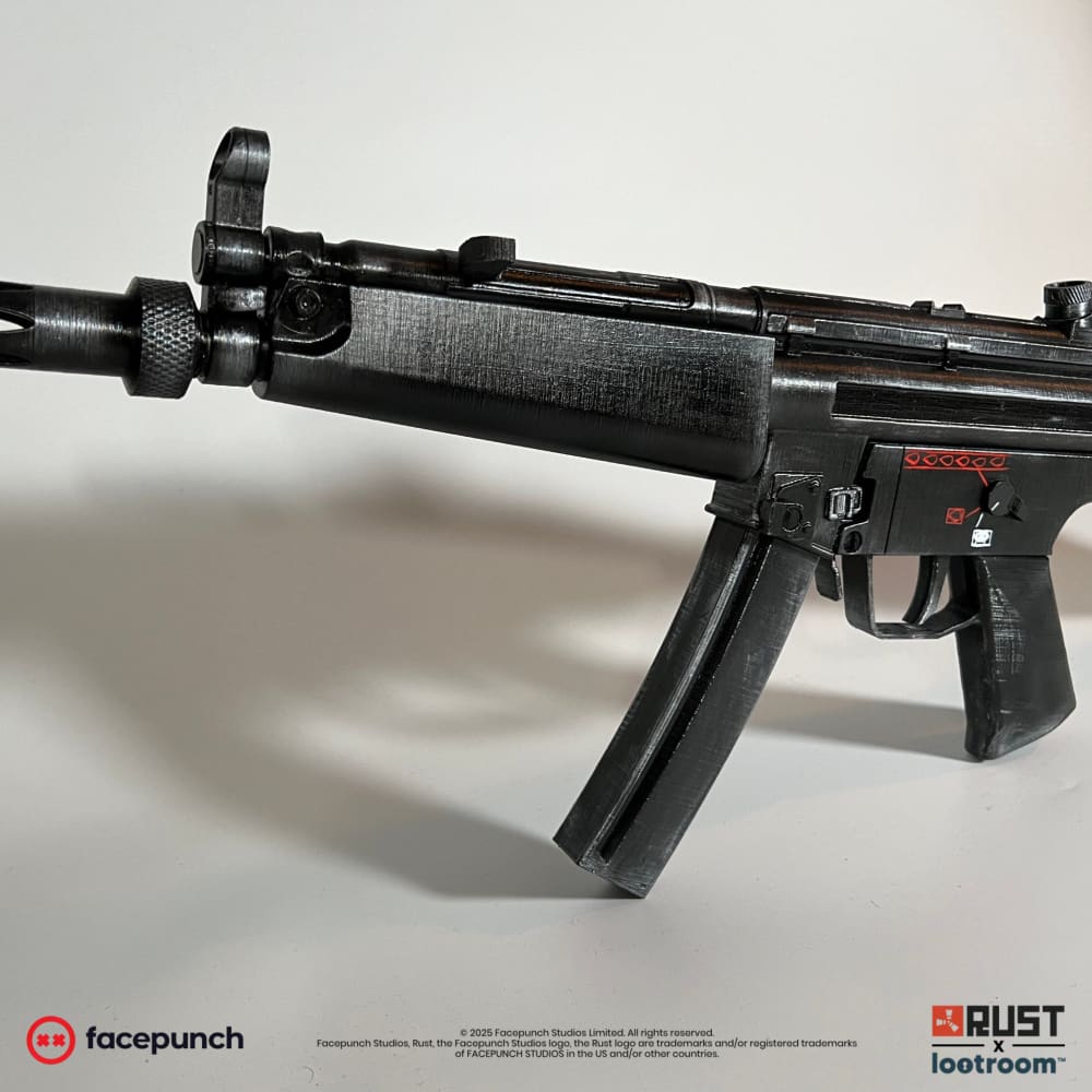 Rust MP5 prop at an angle, barrel and magazine in the foreground