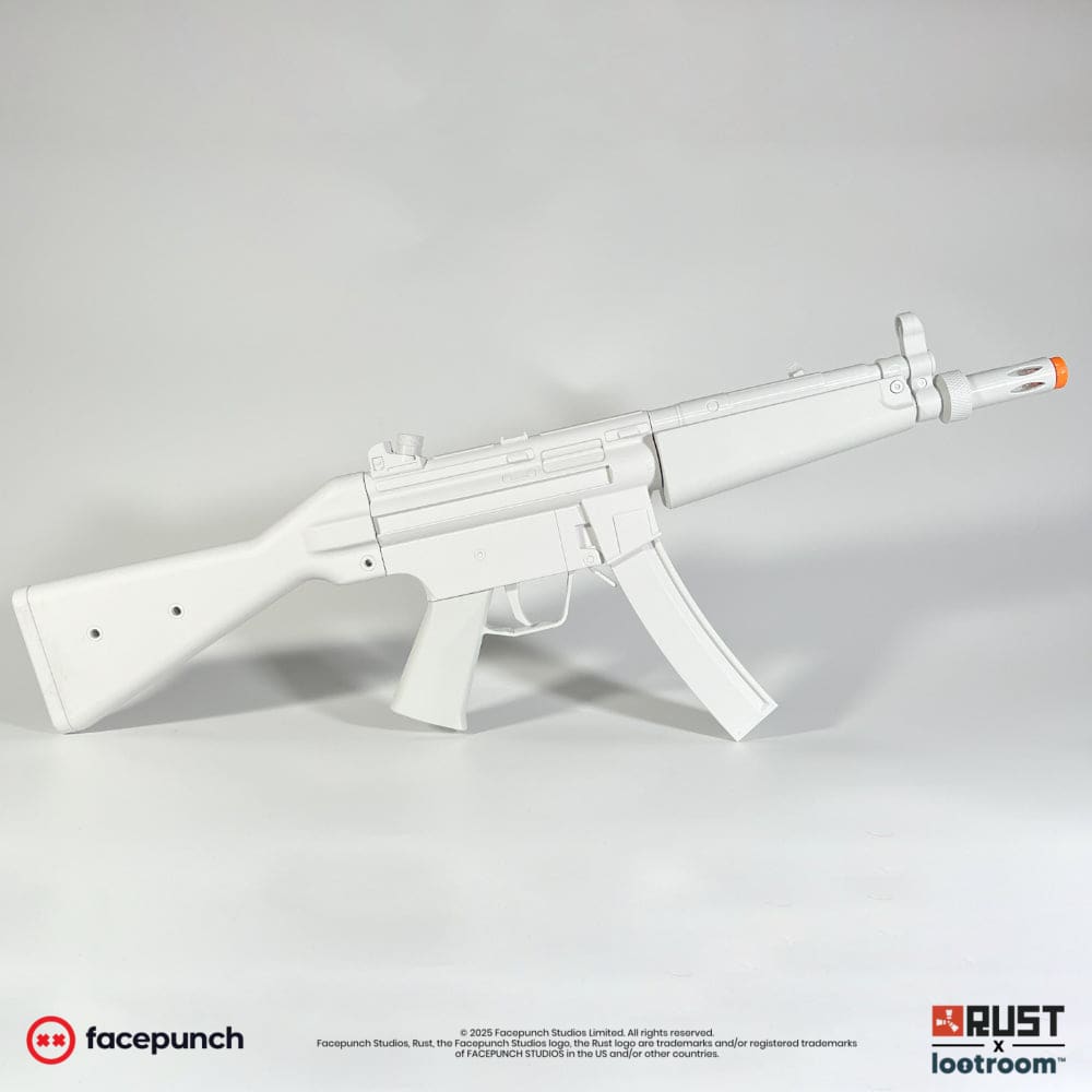 The unpainted light grey Rust MP5 DIY prop from the other side, showing the receiver and the handguard.