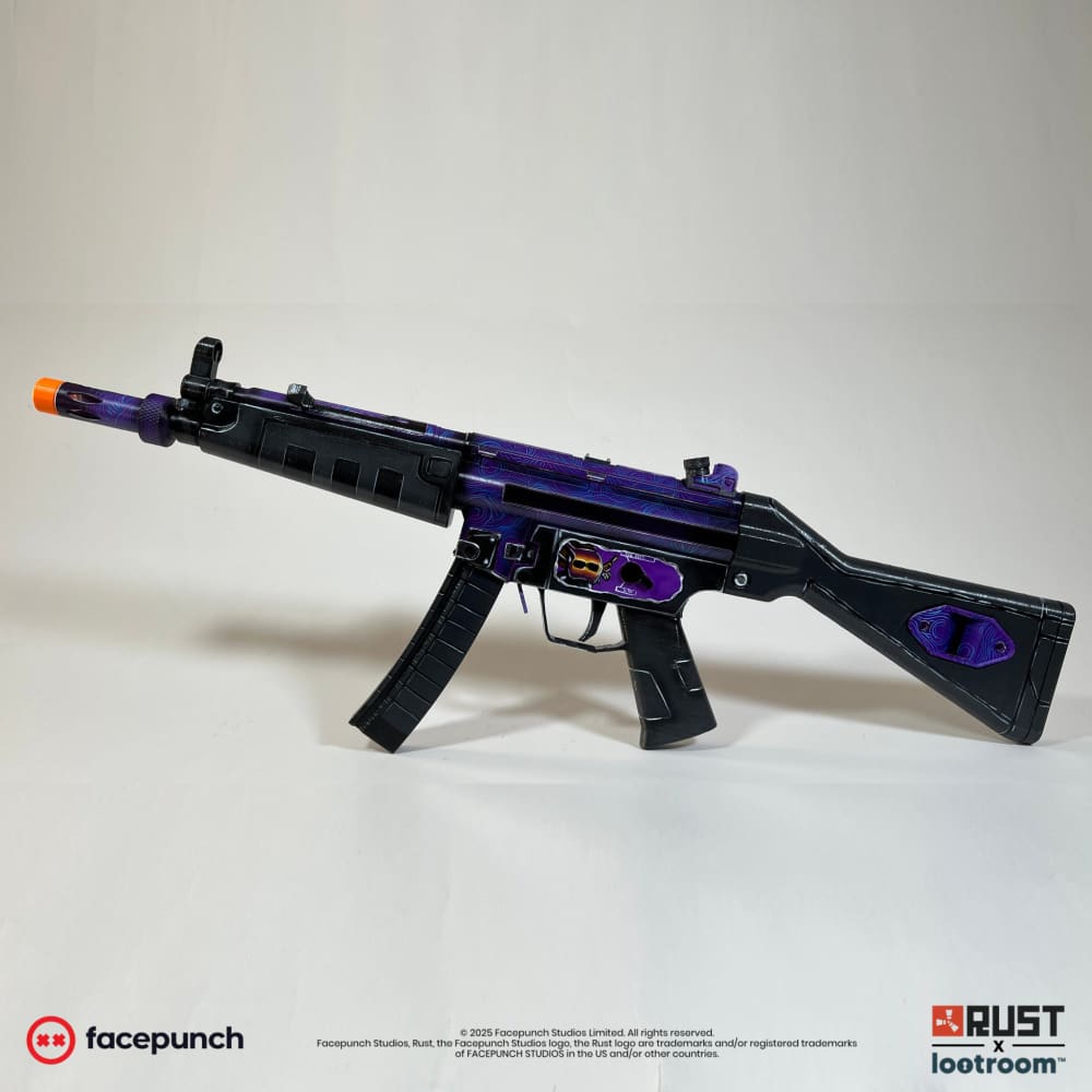 Rust MarkPlayz MP5 prop from the side, deep purple over black with the cyan line pattern along barrel and stock.