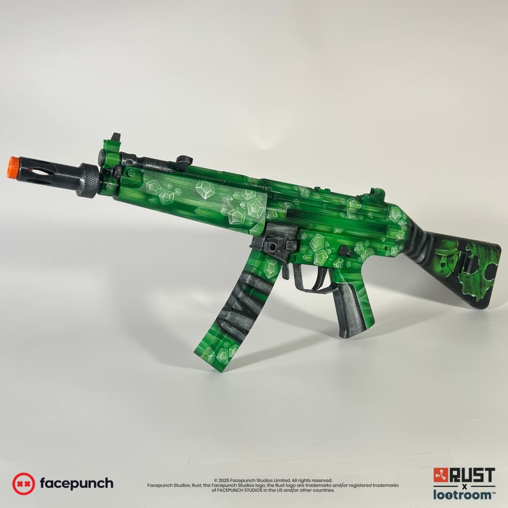 Rust Oilrats MP5 prop at an angle from the left, facets on the handguard and the black pistol grip