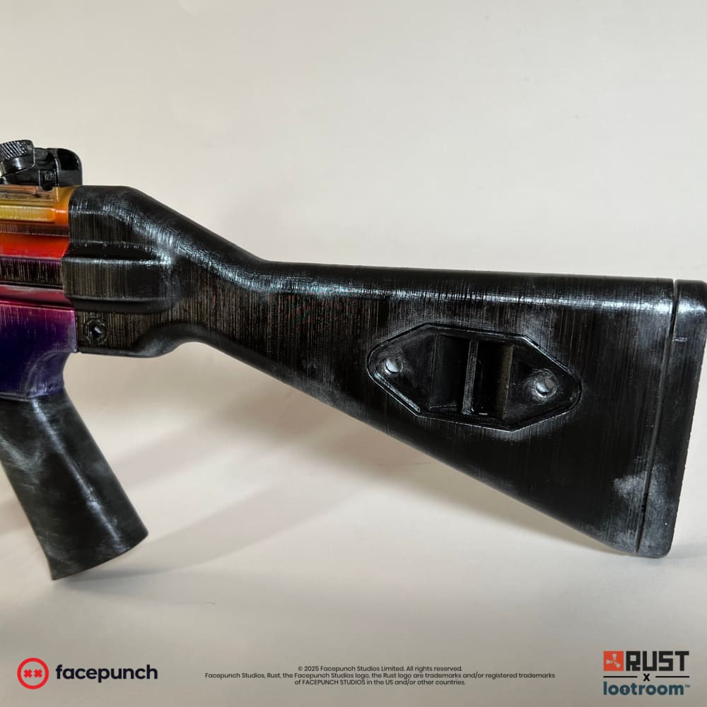 The black stock of the Rust Tempered MP5 prop, silver drybrushed over the edges.