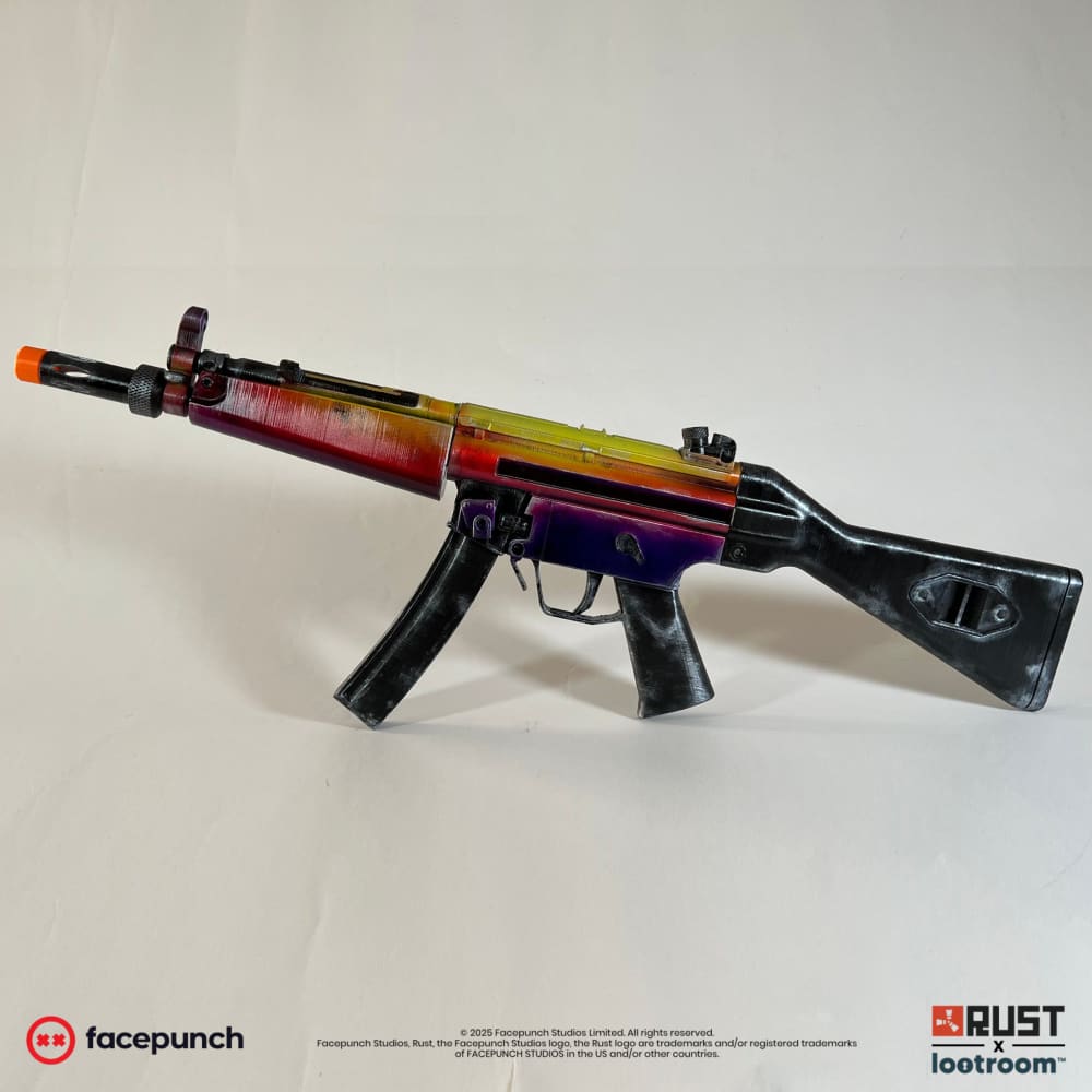 Rust Tempered MP5 prop from the side, the violet-to-yellow heat gradient over barrel and receiver.