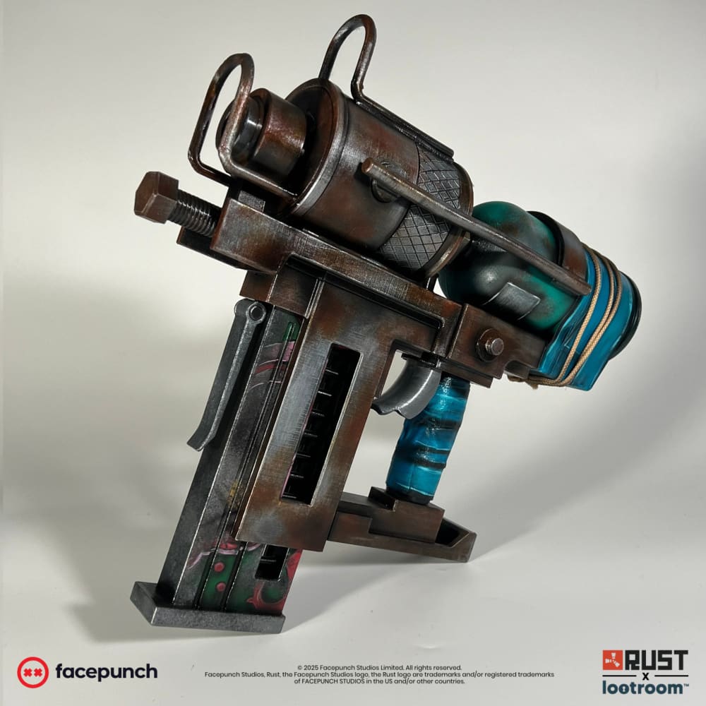 Rust Nailgun prop tilted forward, showing the rust-brown steel look along the frame.