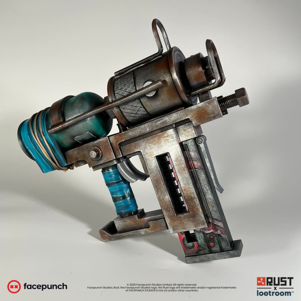 The painted Nailgun from the opposite side, with the bladder and the printed magazine housing in view.