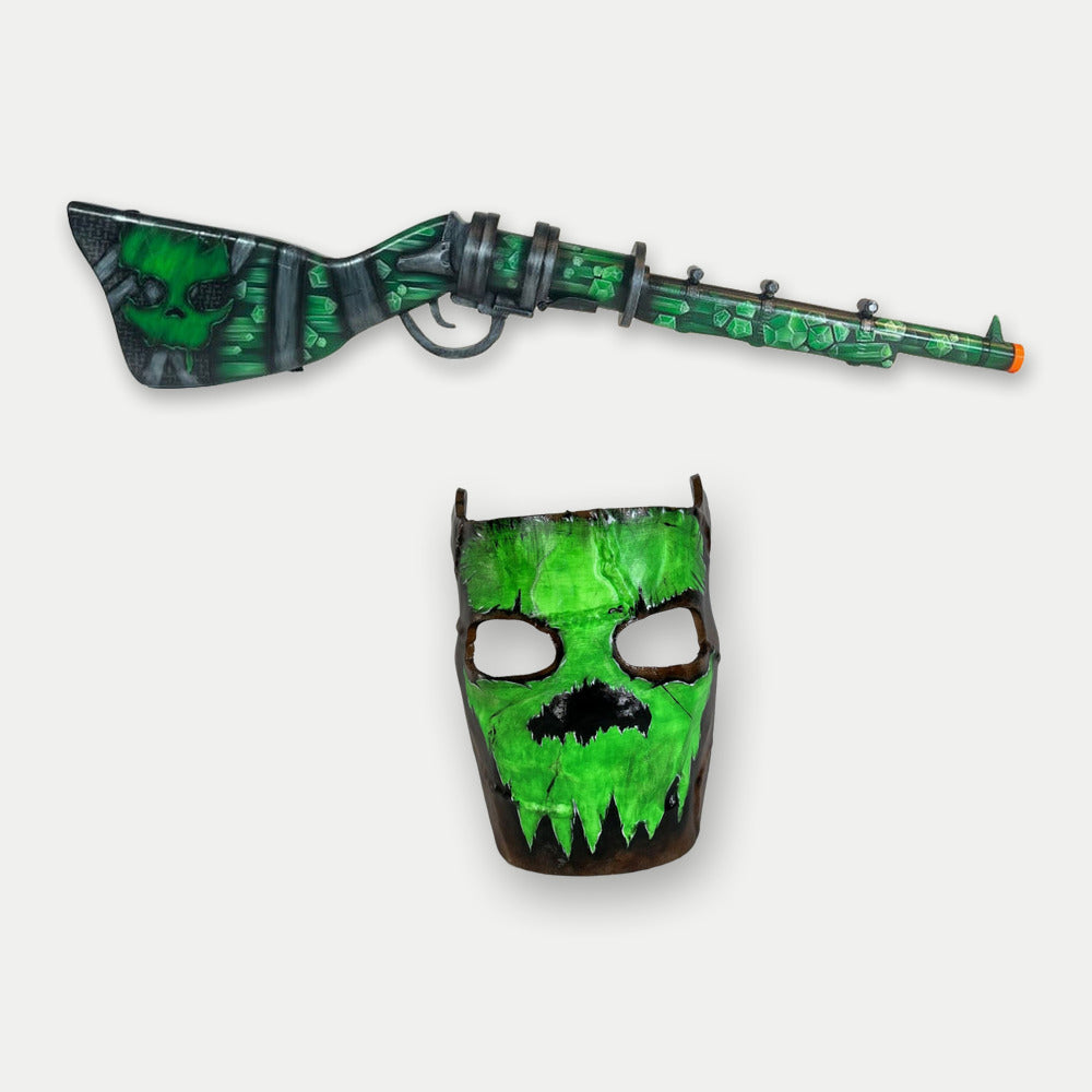 Rust Oilrats kit, the toxic-green Oilrats Waterpipe Shotgun above the Glowing Skull facemask, both hand-painted props on a light studio ground